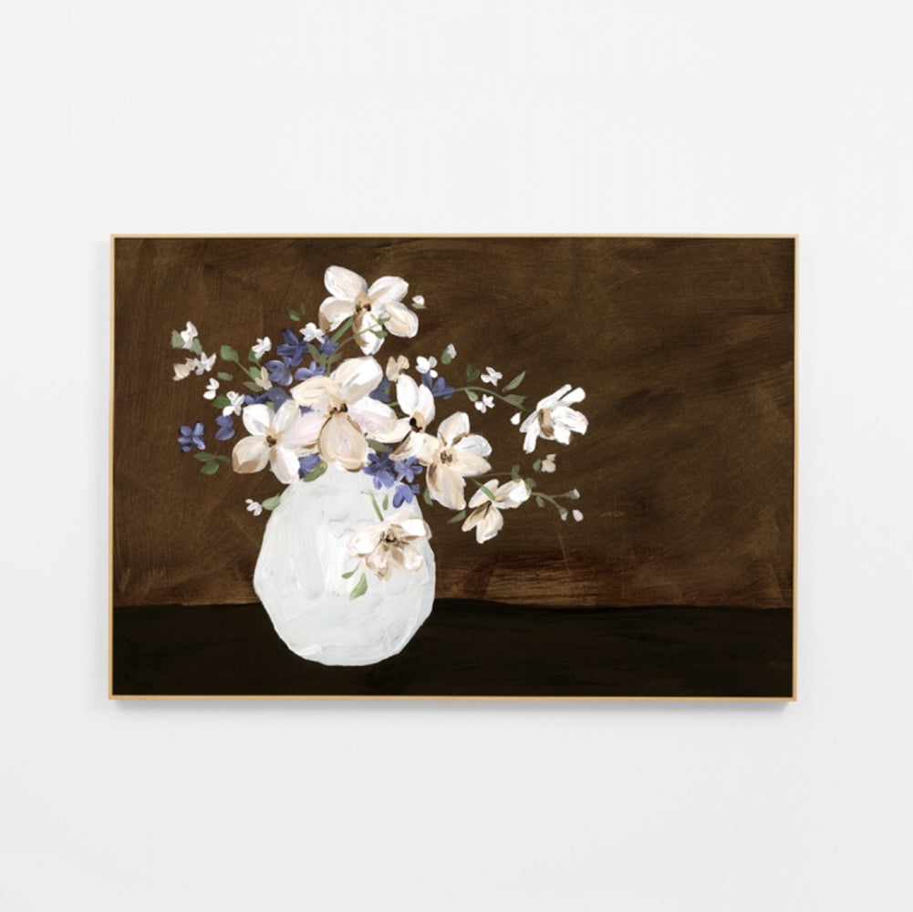 Rectangular canvas wall art print of a painting. Artwork features a vase of soft blush and blue flowers off to the left side with a brown painterly background.