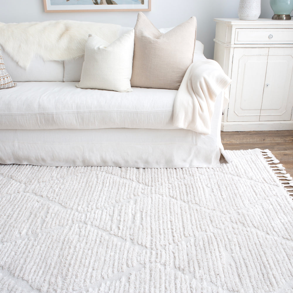 Off white rug with plush pile.
