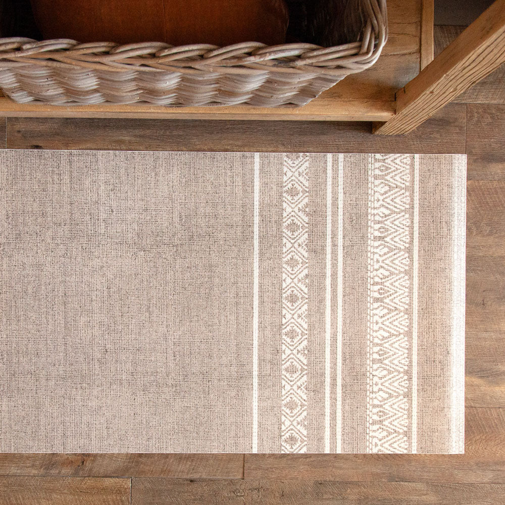 Natural coloured beija floor vinyl mat in with textile texture. 
