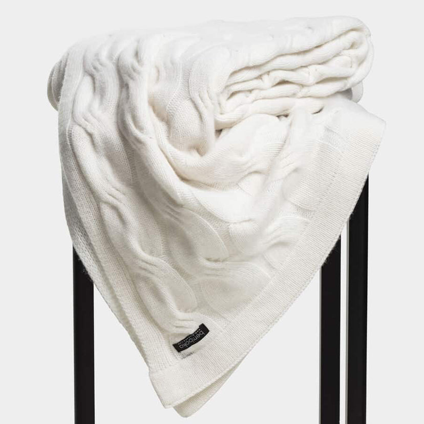 Bemboka Cashmere Chunky Cable Knit Throw in natural off white colour.