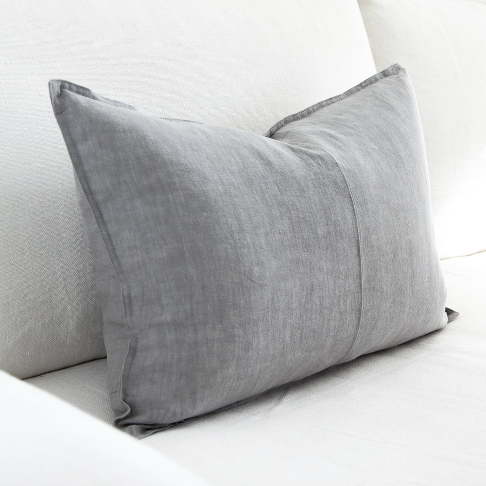 Grey rectangular linen cushion.