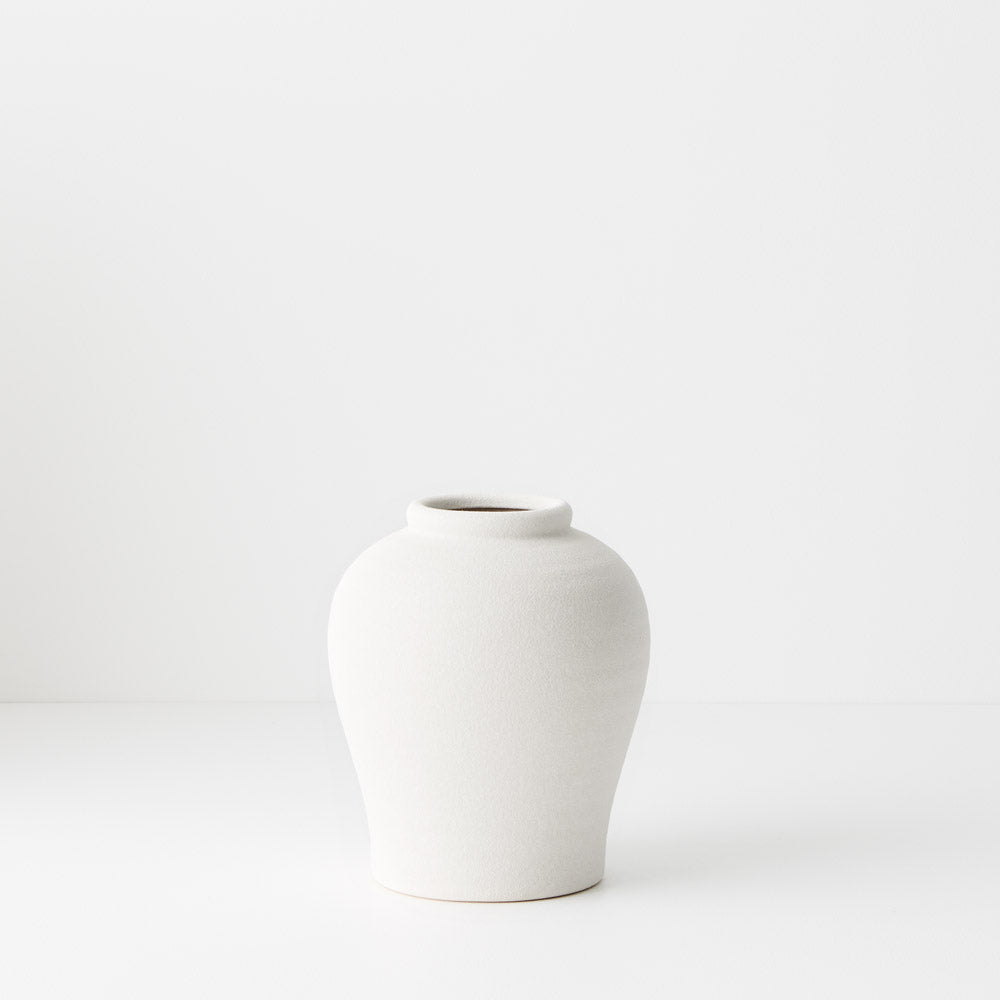 Small white ceramic pot style vase.