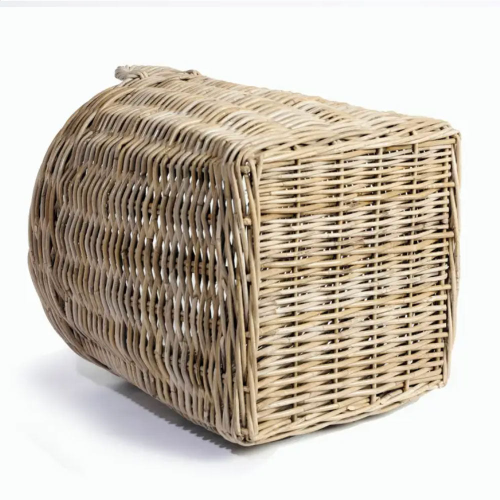 View of the base of a large rattan wicker basket with round top and square base.