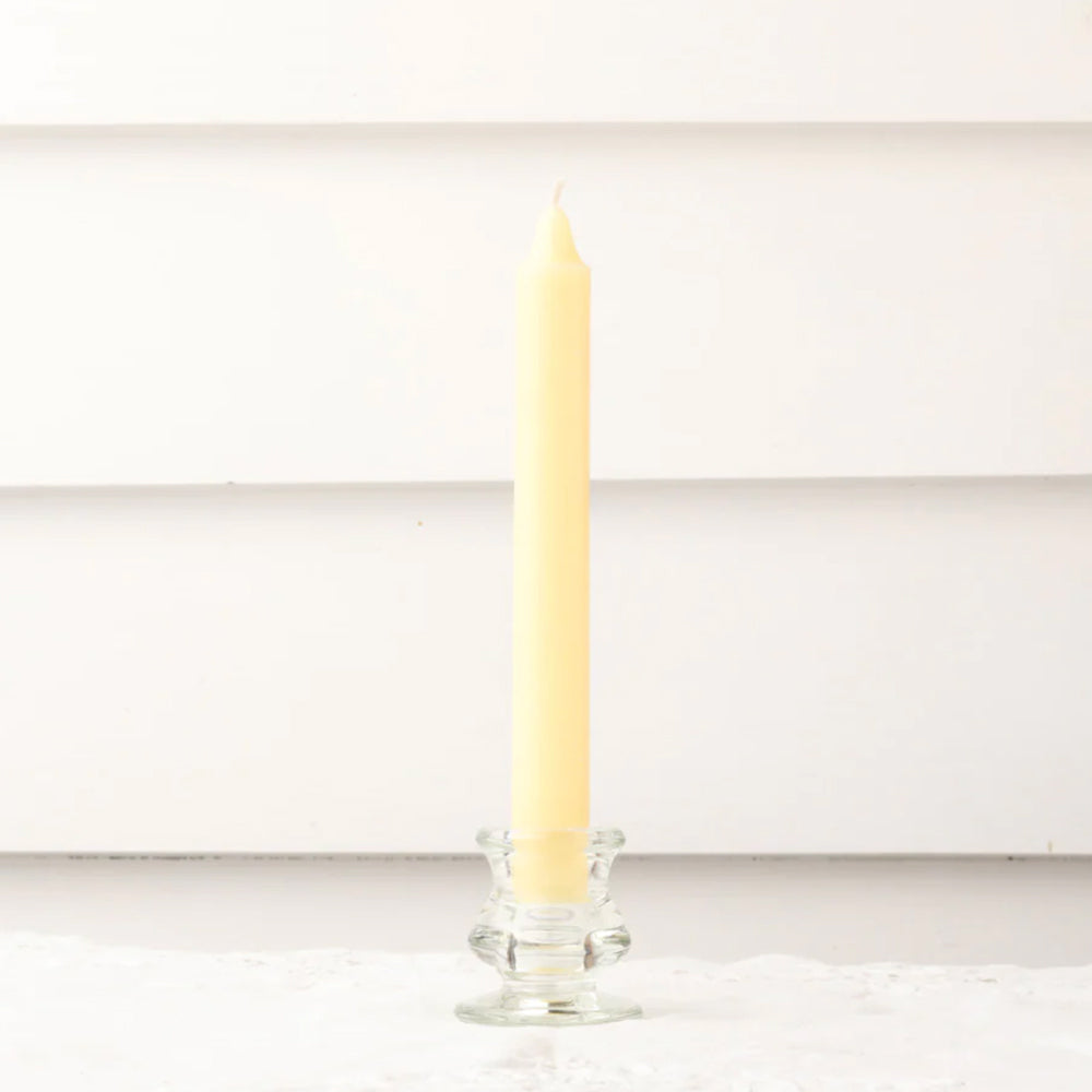 Soft yellow dinner candle.