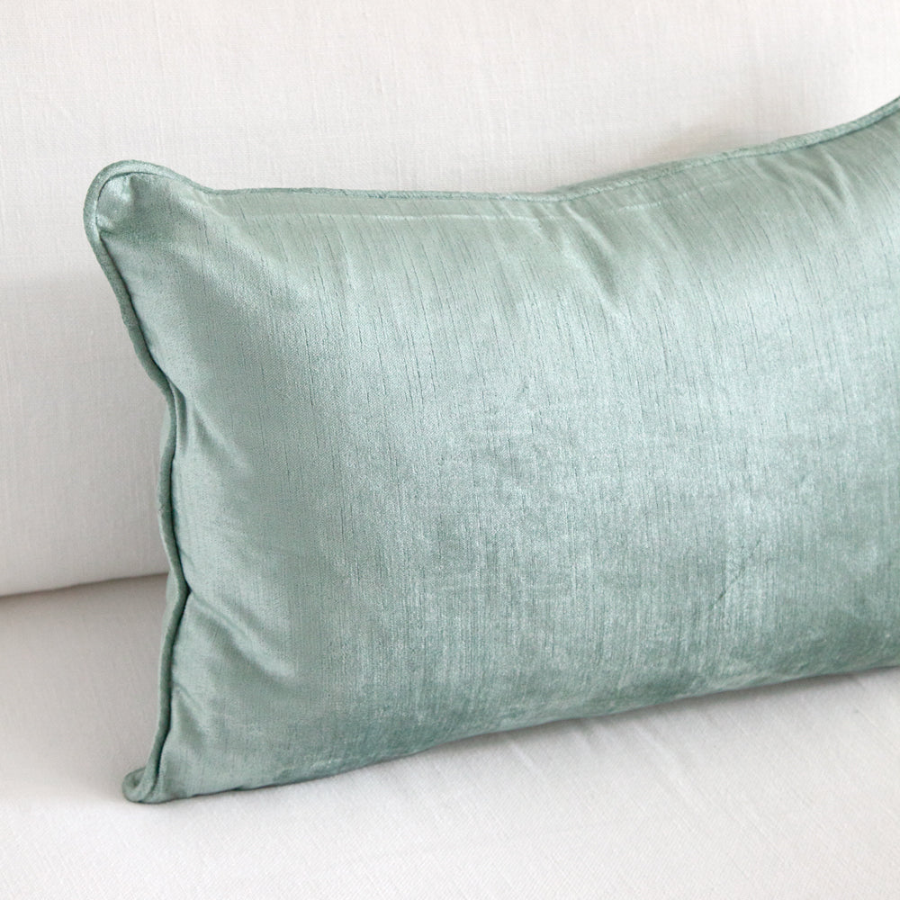 Aqua teal blue green rectangular velvet cushion.