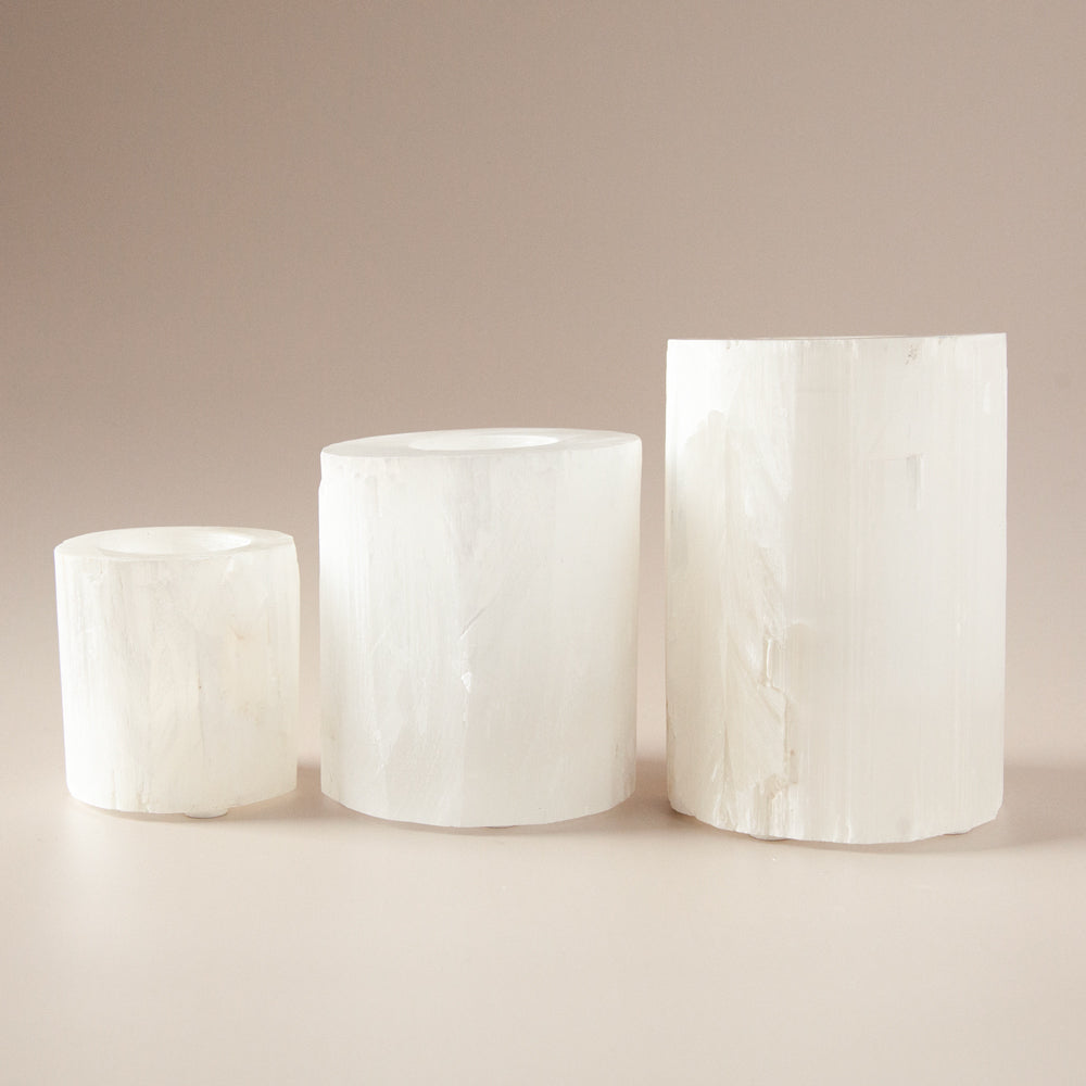 Three sizes of selenite candle holders