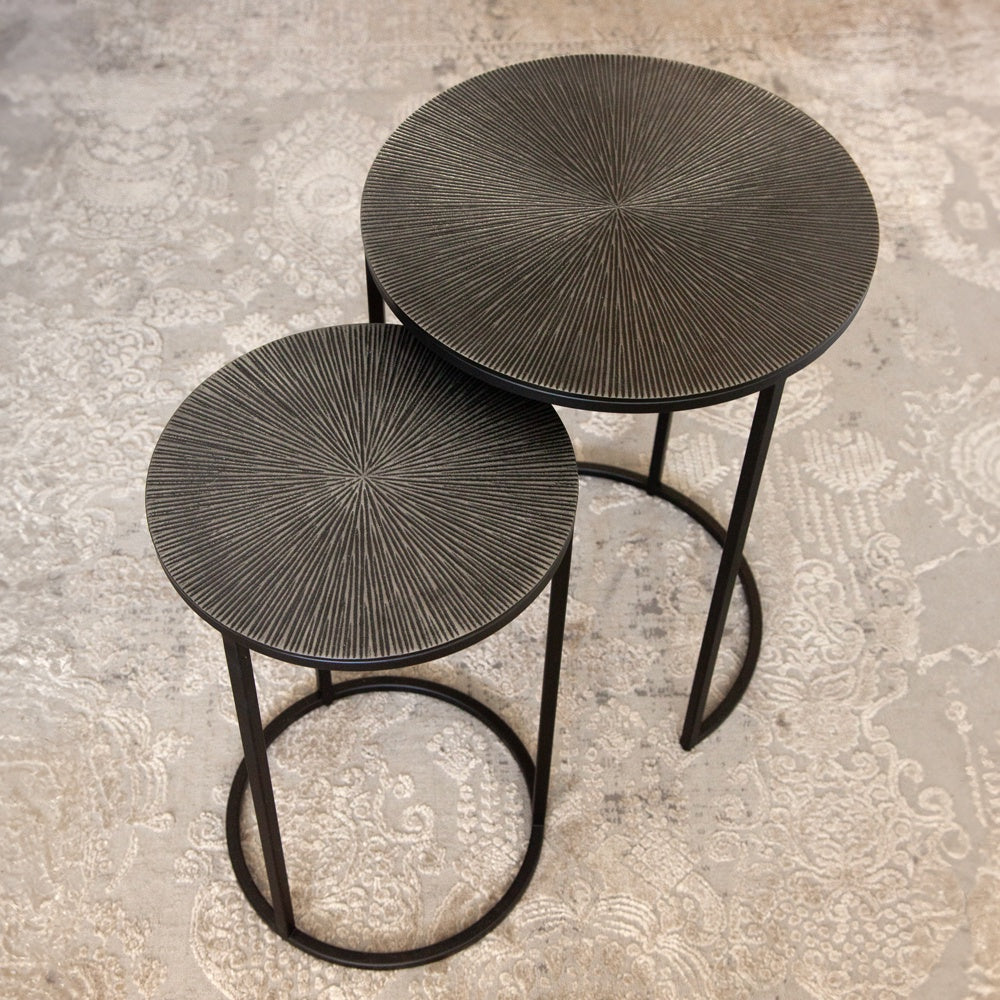 Round nesting side table set with gunmetal coloured tops with a textured finish.