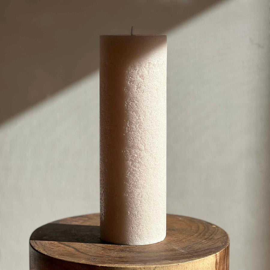 Large textured pillar candle.