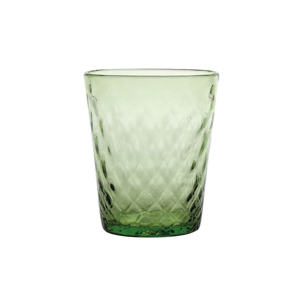 Green glass tumbler with a diamond rib texture.