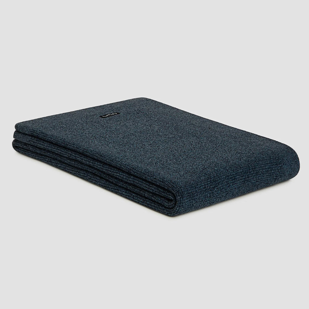 Bemboka small box knit throw in marl blue ink colour.