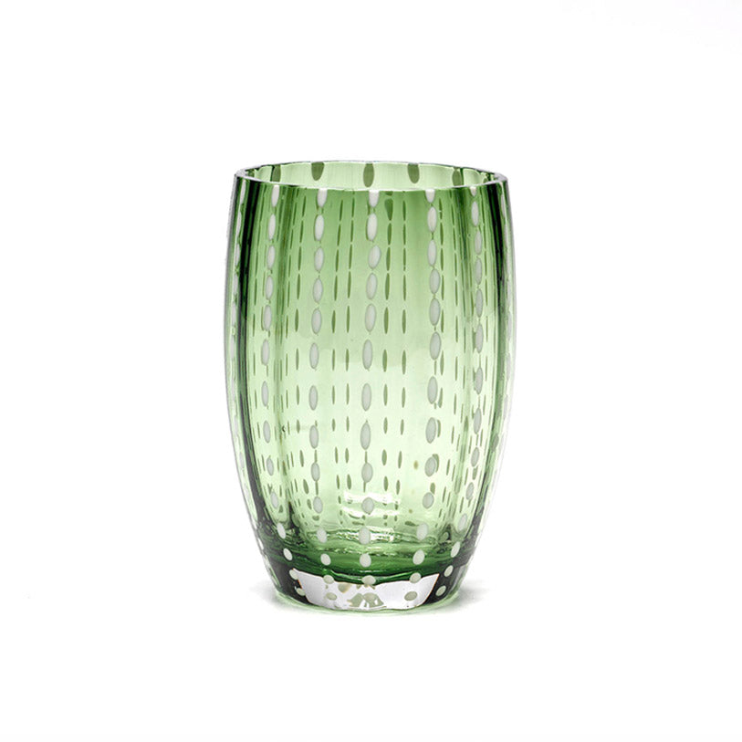 Green tumbler glasses with white dots running down the glass.