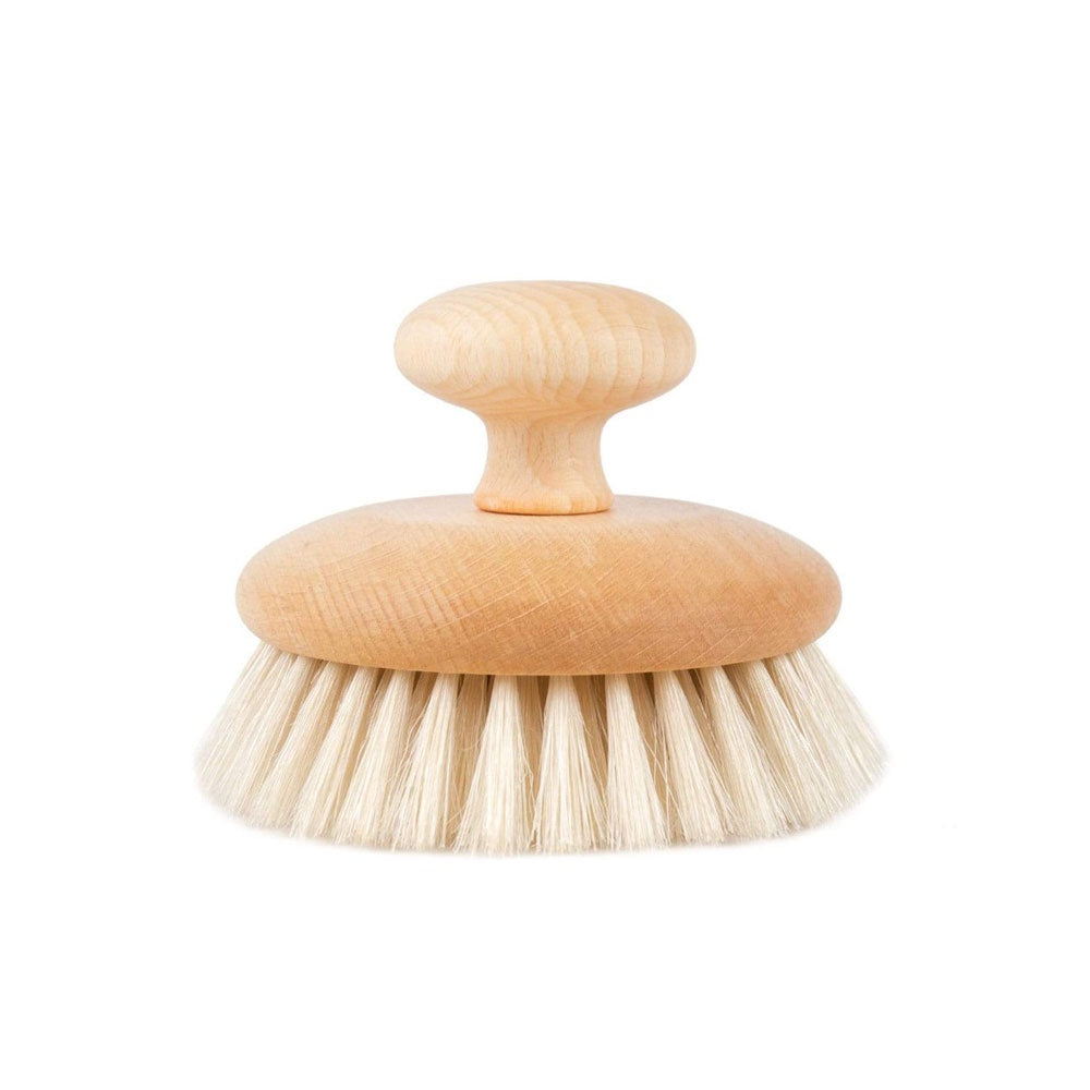 Round wooden massage bath brush with handle.