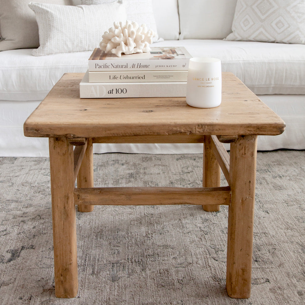 Square wooden coffee table make from recycled elm. 