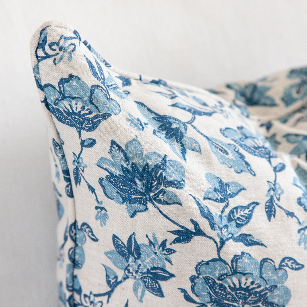 Close up of Walter G Java Riviera Cushion featuring a blue floral design.