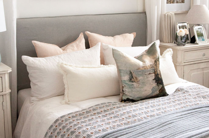 A styled queen size bed