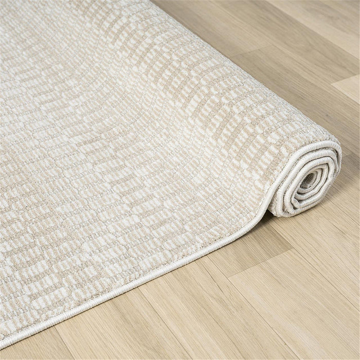 a neutral coloured floor rug