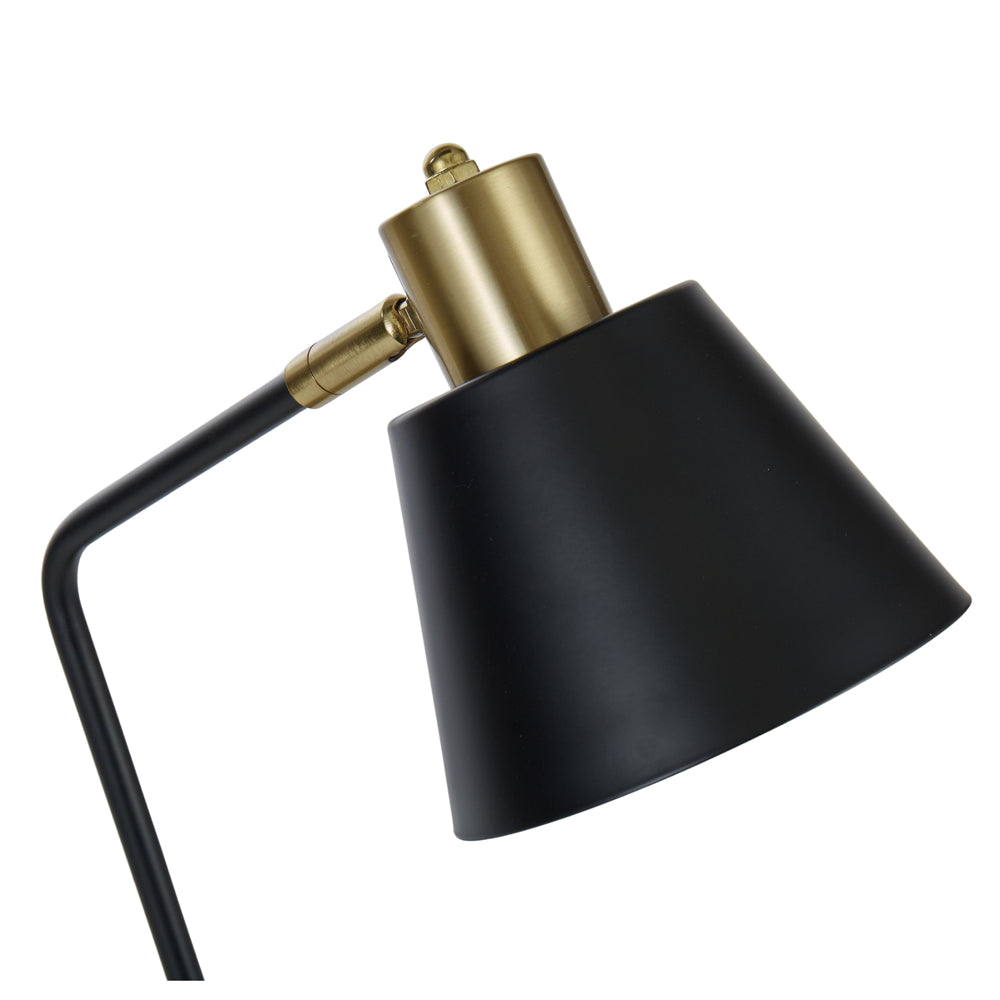 Black and brass desk lamp.