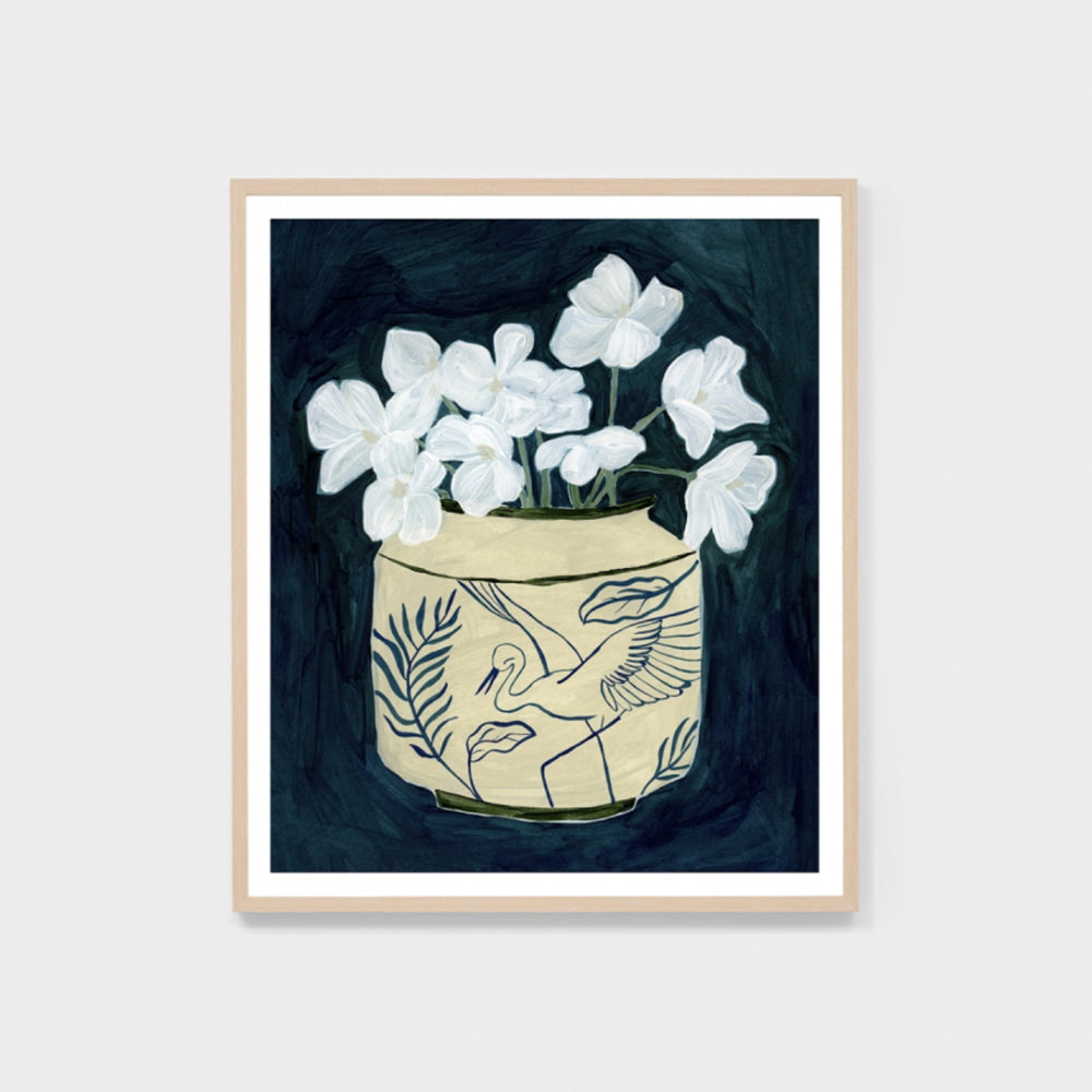 Framed print featuring painted vase with white flowers on dark blue background. 