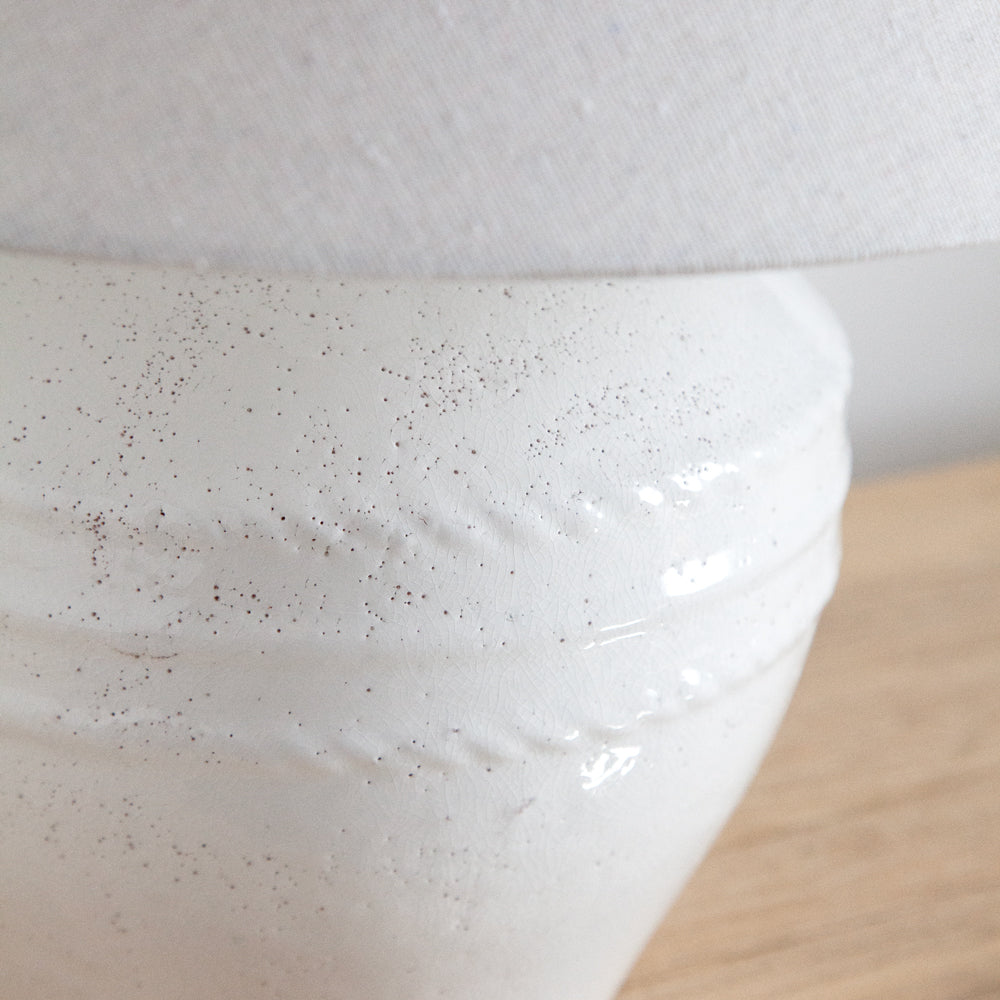 Close up detail of the glaze texture of the beachside lamp.
