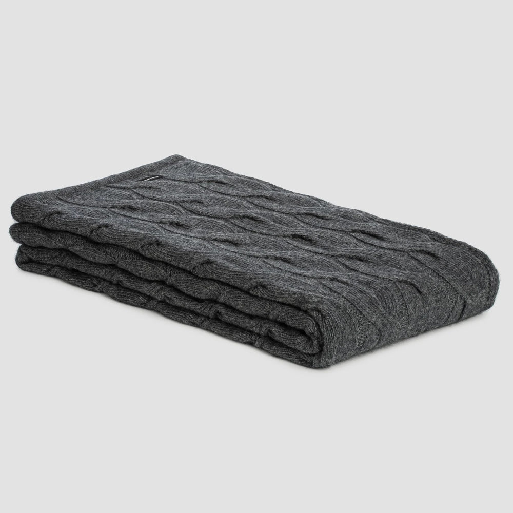 Bemboka angora merino chunky cable knit throw in grey.