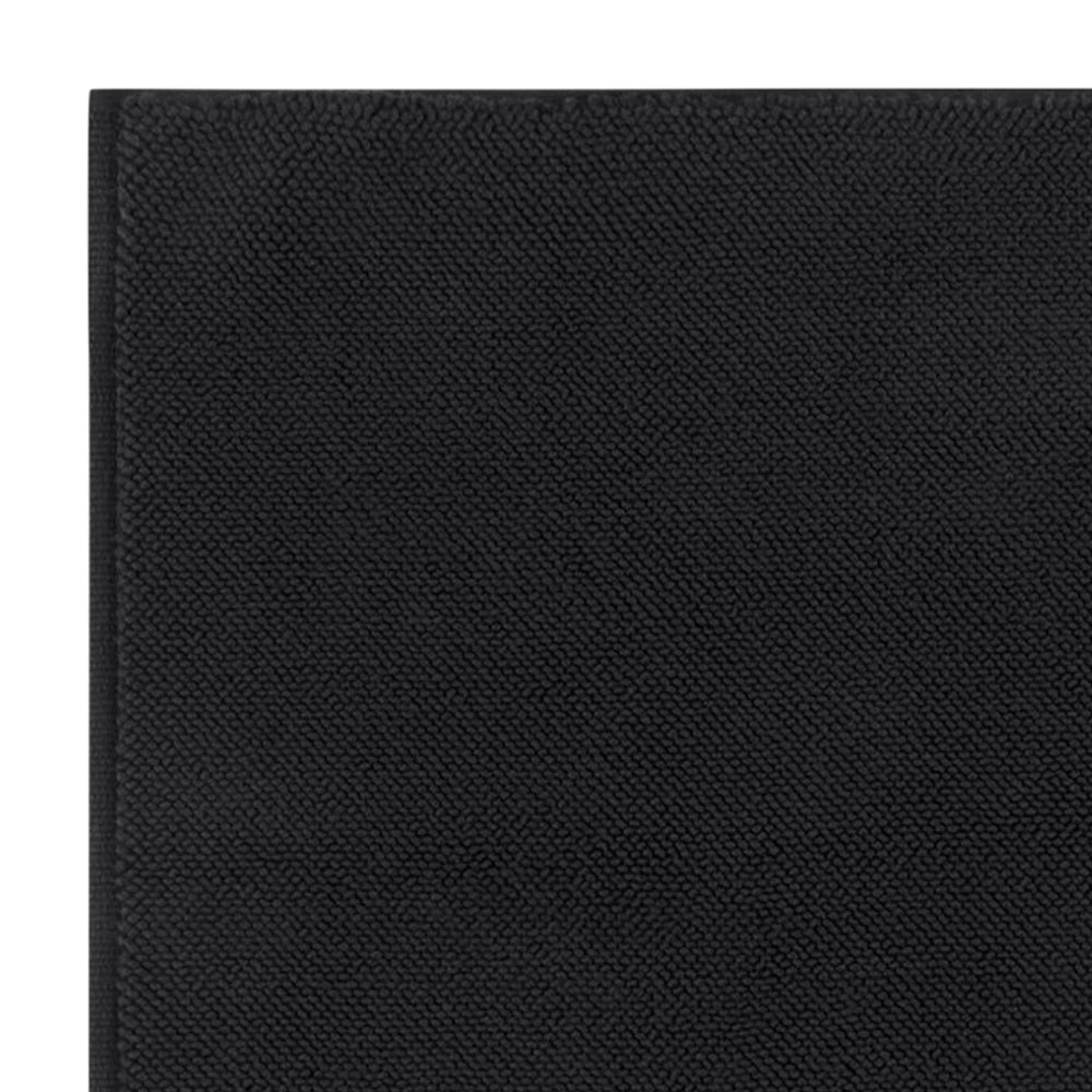 Close up of Bemboka Micro cotton bath mat in black.