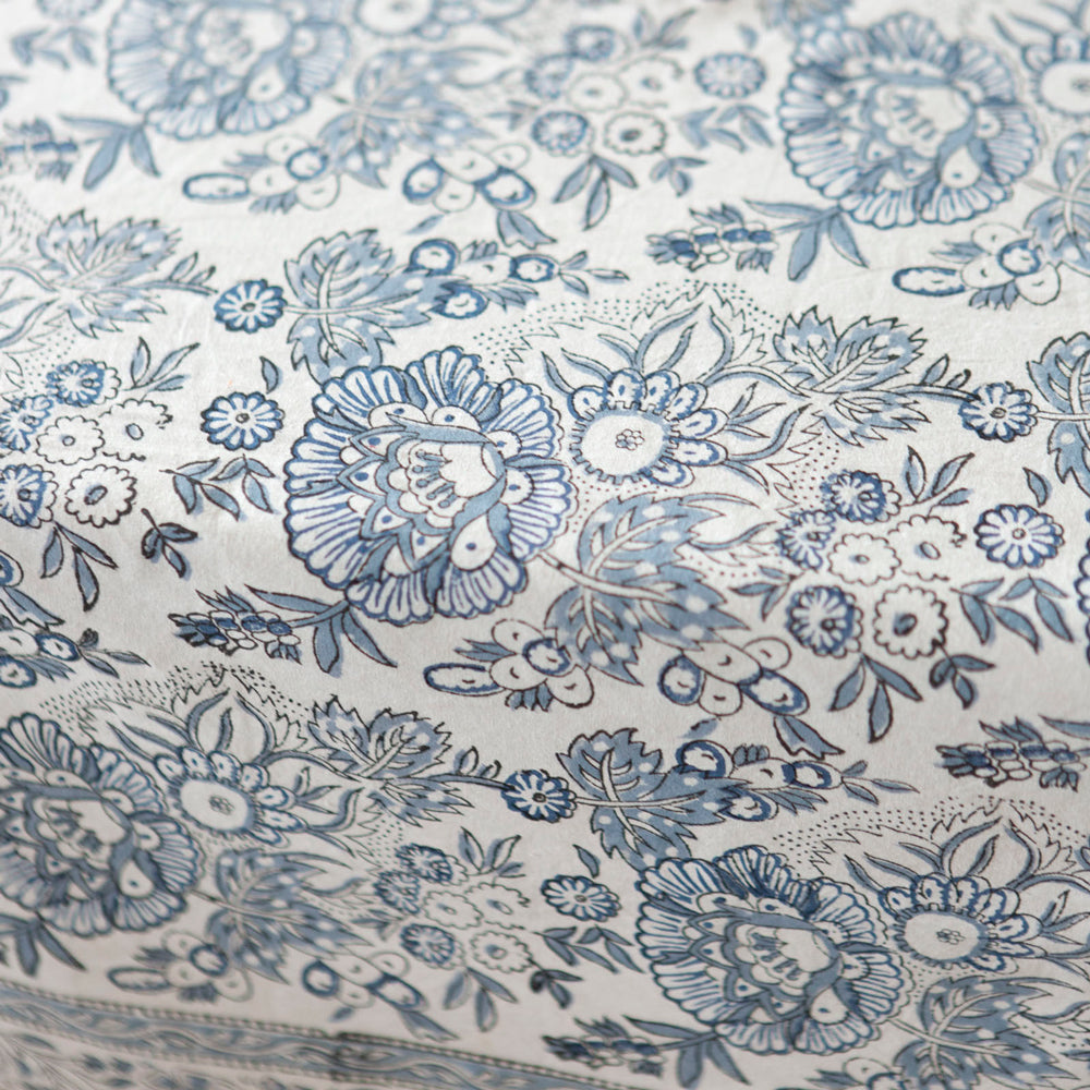 White and blue block printed tablecloth.