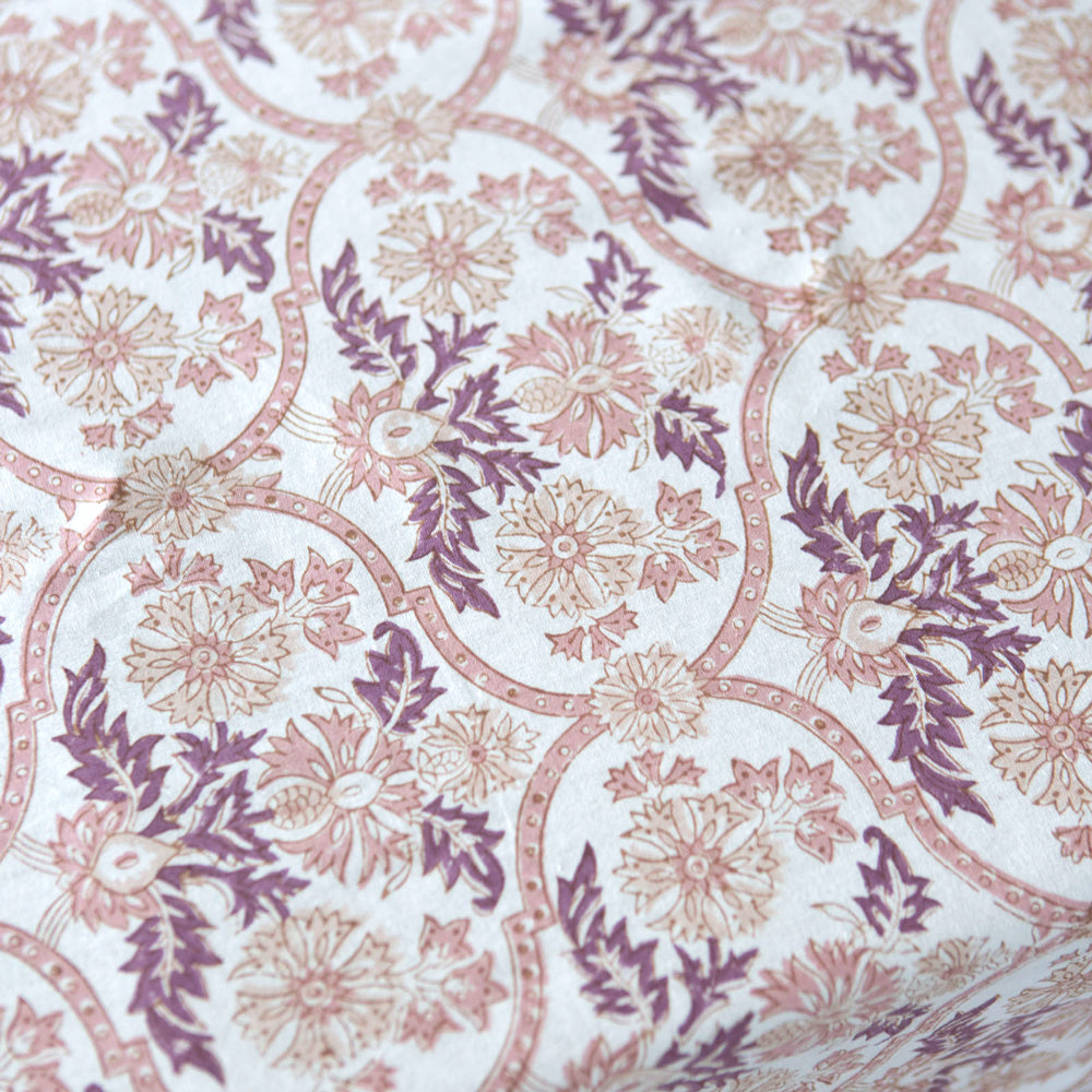 Pink block printed tablecloth.