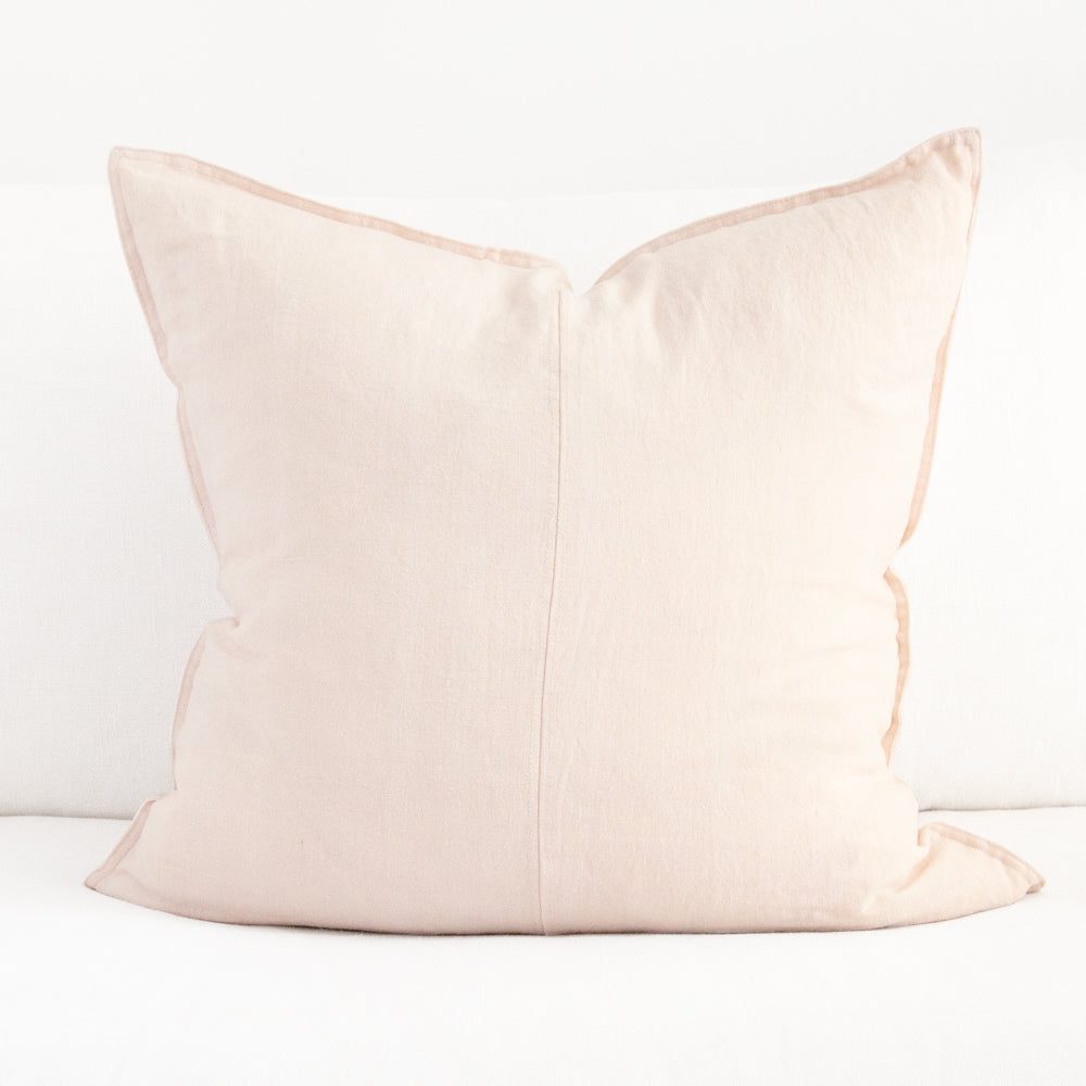 Large square pale pink linen cushion.