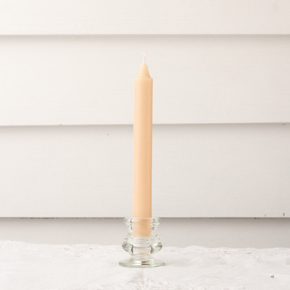 Taupe / Beige coloured dinner candle in clear glass candle holder.