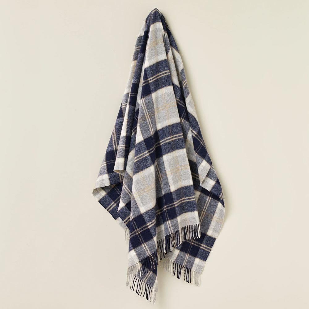 Grey and navy tartan throw