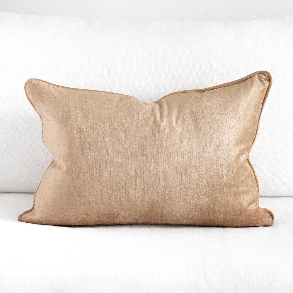 Soft gold velvet cushion.