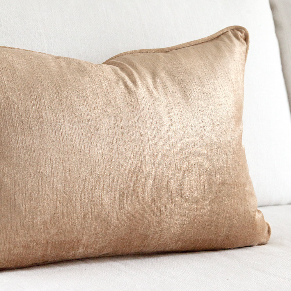 Soft gold velvet cushion. Rectangular cushion with piping.