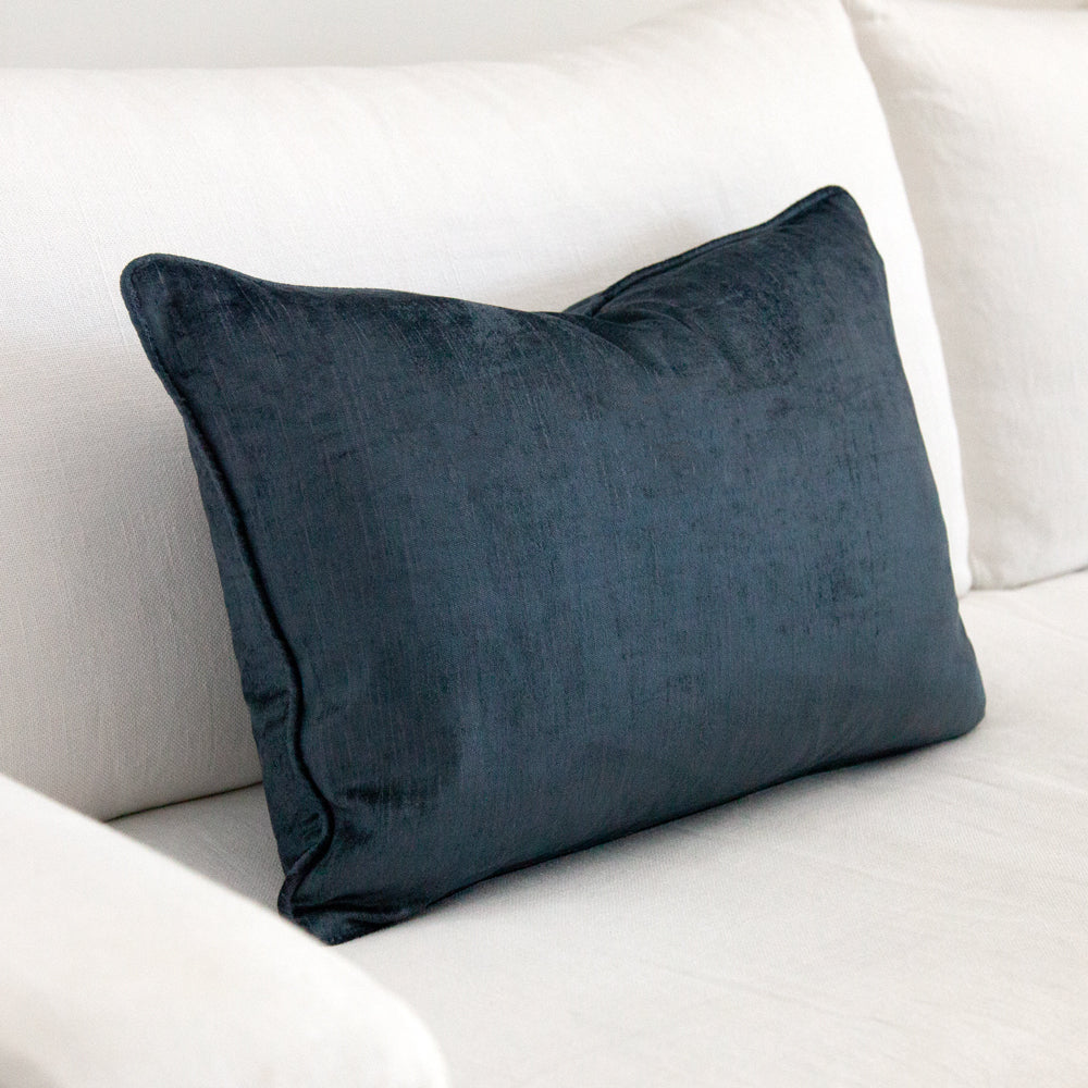 Blue crushed velvet rectangular cushion.