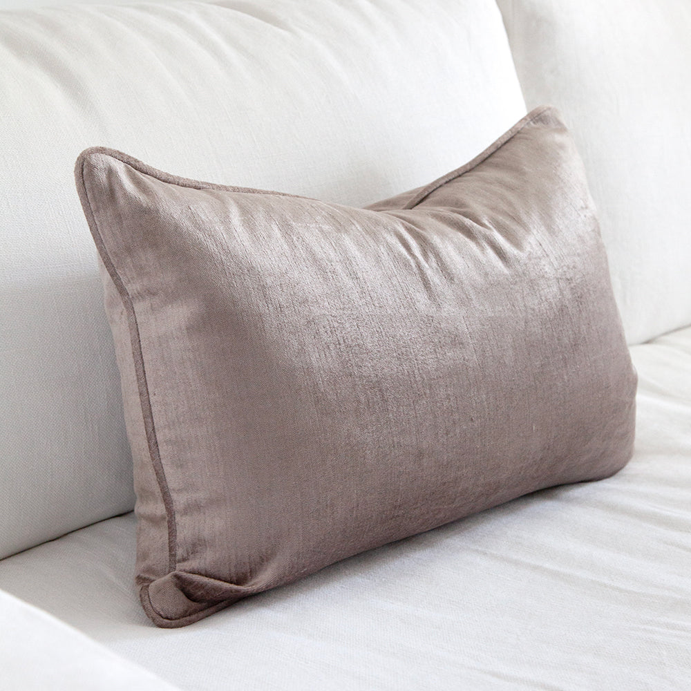Side view of mauve rectangular velvet cushion.
