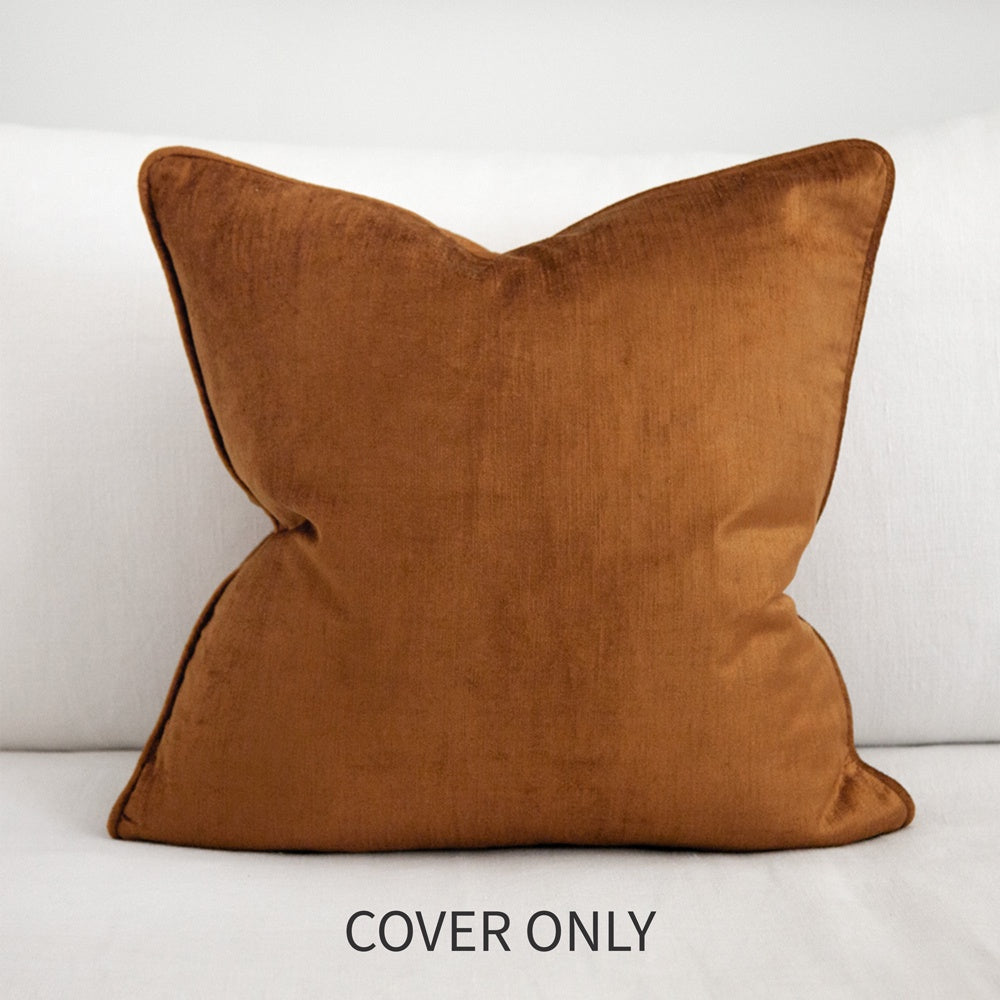 Ochre velvet cushion cover.