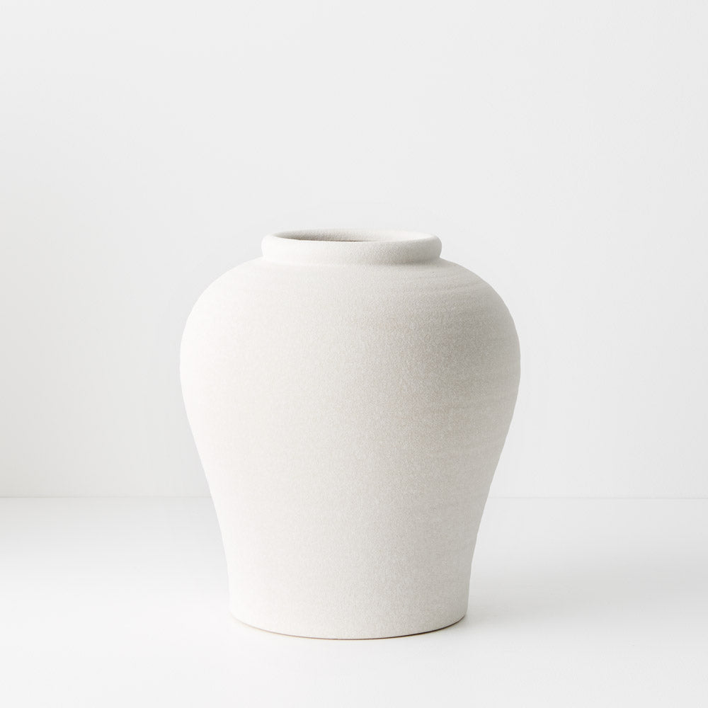 medium white ceramic pot style vase.