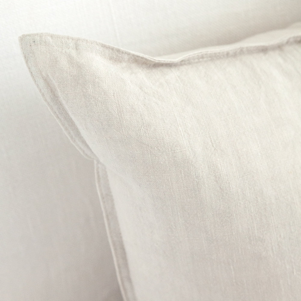 Soft natural linen coloured cushion.