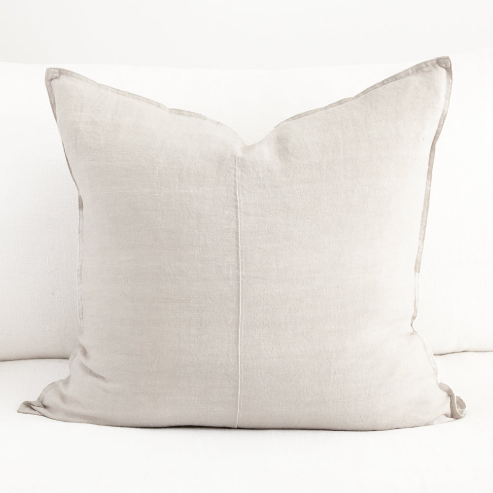 Large square beige linen cushion.