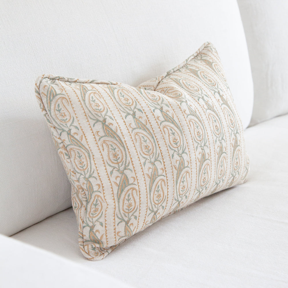 Jasmine Block printed cushion on white sofa.