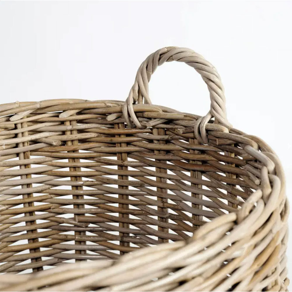 Large rattan wicker basket with round top and square base.