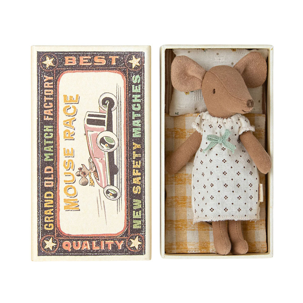 Maileg brown big sister mouse with white vintage style dress and matchbox bed with bedding.