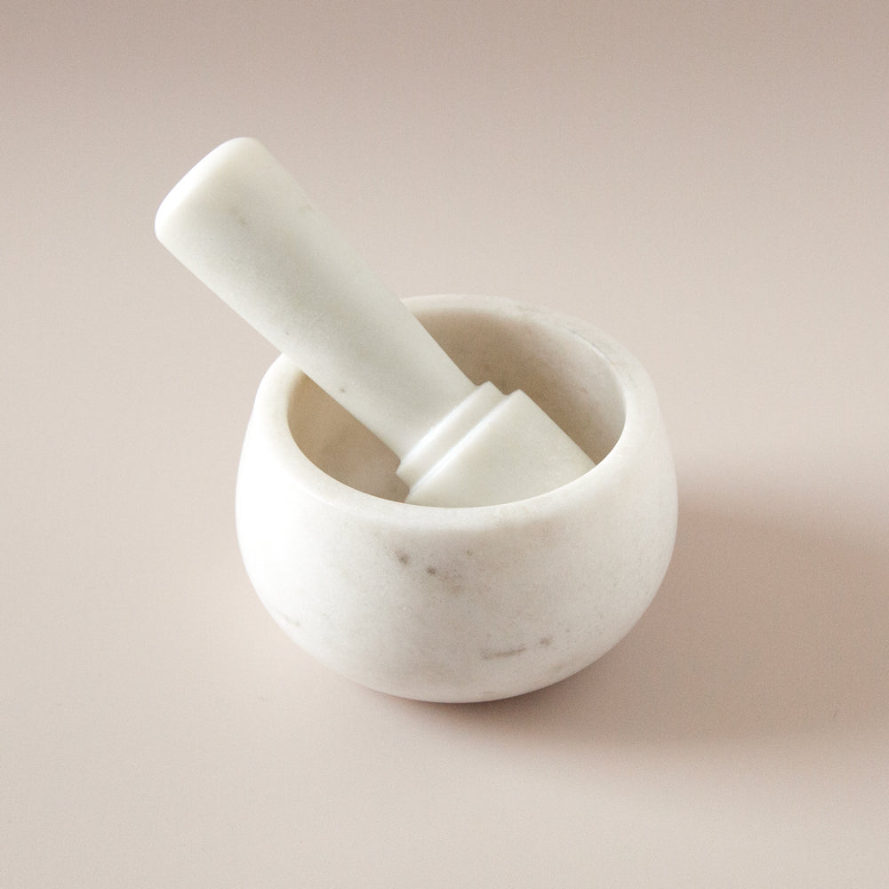 smooth, modern white marble mortar and pestle