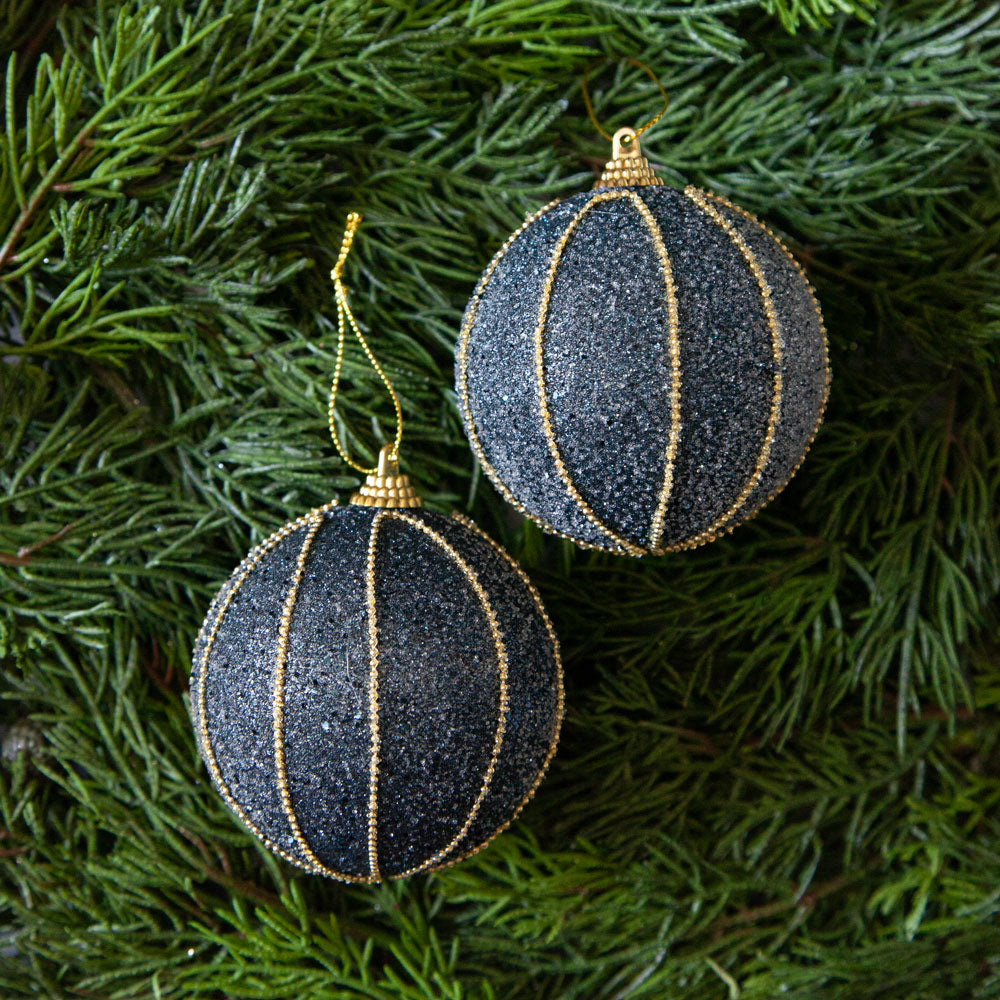 Midnight blue bauble with gold beaded details.