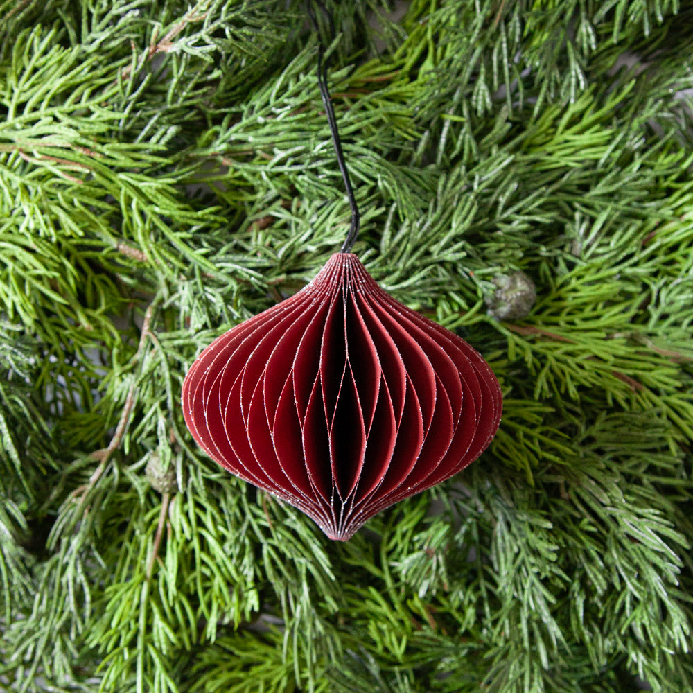 Red honeycomb paper Christmas decoration. 