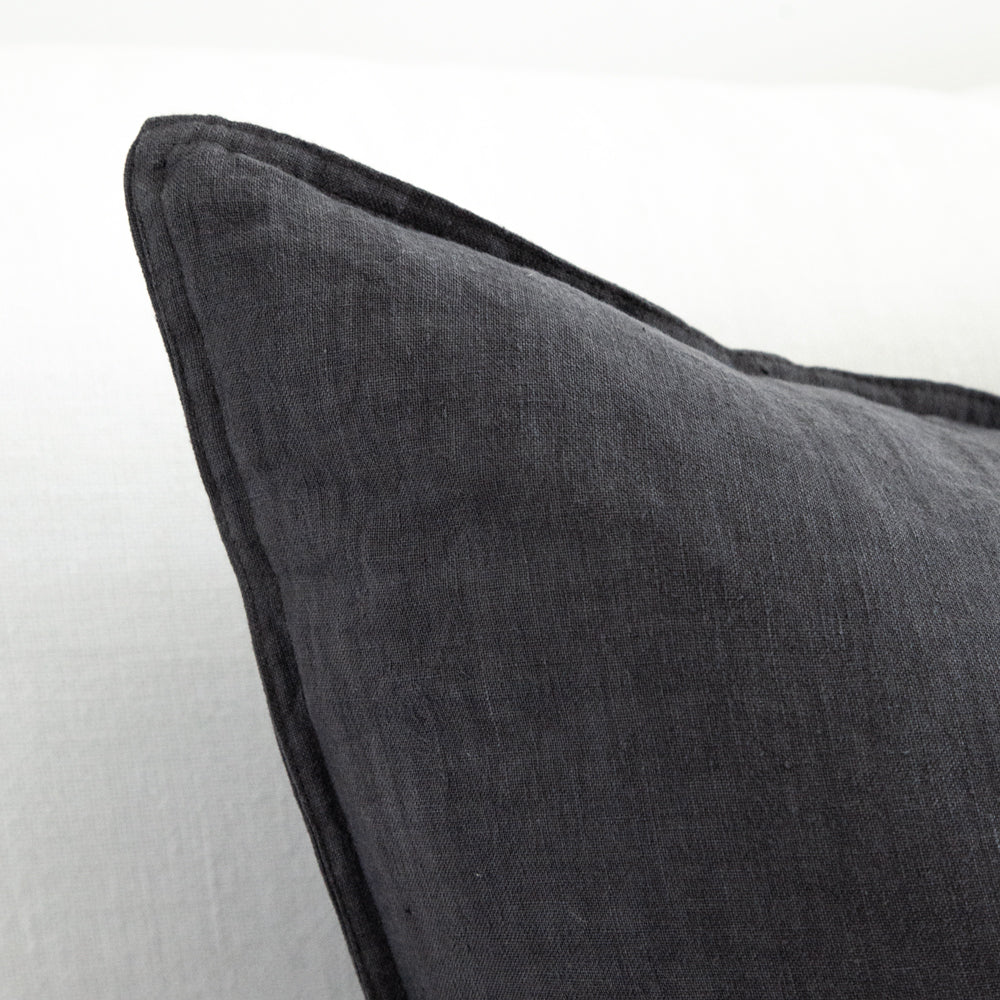 Close up of charcoal linen cushion fabric.