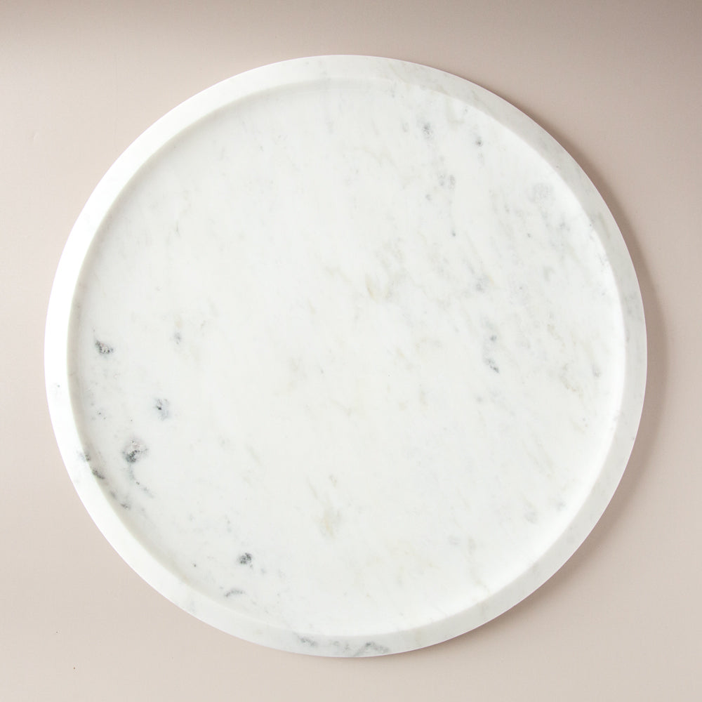 Round marble serving platter.