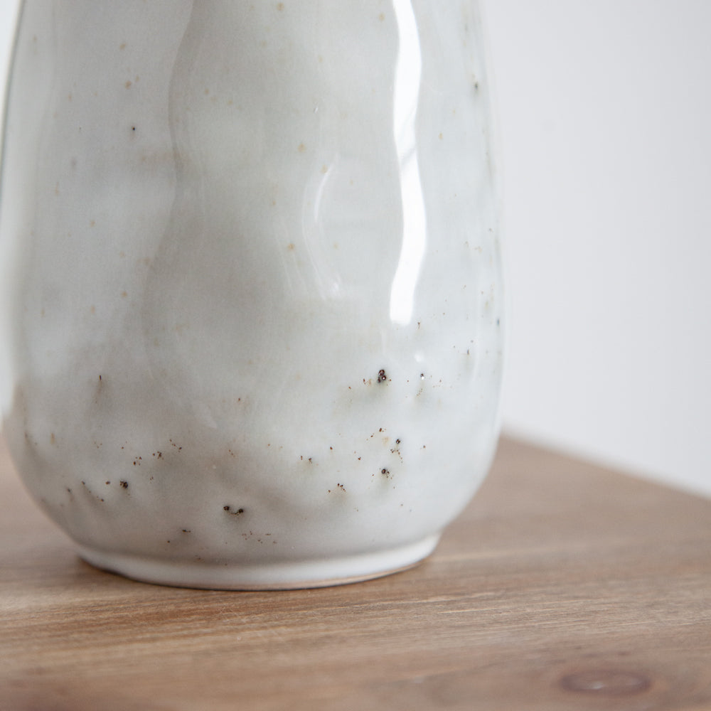 Close up of texture in glaze of ceramic jug.