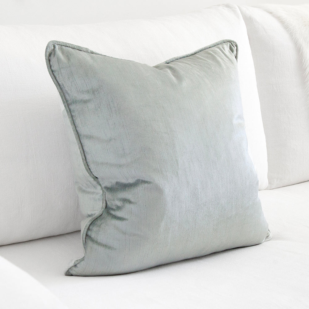 Silver blue square velvet cushion.