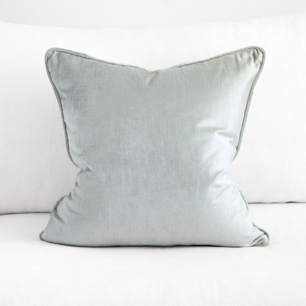 Silver blue square velvet cushion.