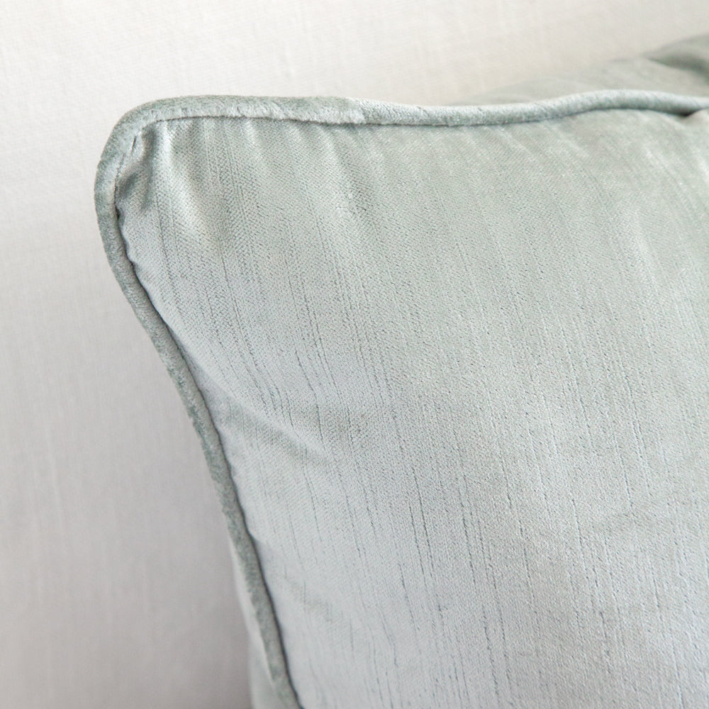 Silver blue square velvet cushion.